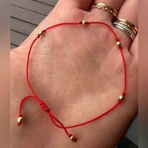 Red string bracelet